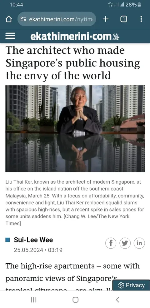 The screenshot features an article from ekathimerini.com titled "The architect who made Singapore’s public housing the envy of the world." The article highlights Liu Thai Ker, described as a key architect in modernizing Singapore’s housing. The main image shows an older man, presumably Liu Thai Ker, seated at a reflective surface, likely a desk, with a backdrop of large urban high-rise buildings. His posture is composed, with hands placed thoughtfully. There's an emphasis on natural light and greenery, as potted plants flank his workspace, contributing to a sense of balance between urban and natural elements.
The article, published by The New York Times and written by Sui-Lee Wee, emphasizes Liu's contributions to transforming slums into affordable, community-focused high-rise apartments. The visual and textual elements underscore his commitment to integrating convenience and light in housing design. The date of the article is marked as May 25, 2024. The setting indicates a spacious office environment, reflecting the modern architectural themes Liu Thai Ker is known for. The mood is contemplative, reflecting on past achievements and current challenges related to housing costs.
- Title: "The architect who made Singapore’s public housing the envy of the world"
- Site / app: "ekathimerini.com"