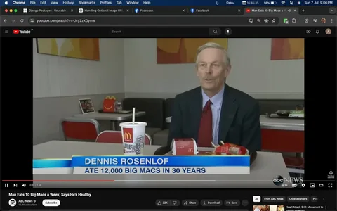 The image is a video frame from a YouTube video titled "Man Eats 10 Big Macs a Week, Says He's Healthy," published by ABC News. The scene is set inside a McDonald's restaurant, featuring Dennis Rosenlof seated at a table. He is dressed in a formal suit with a red tie, conveying a professional appearance. In front of him on the table are iconic McDonald's items: a drink cup, a box that likely contains a Big Mac, and a packet of fries. The setting is typical for a fast-food restaurant, with bright lighting and simple decor. The video appears to be an interview segment, as indicated by the on-screen text that reads "DENNIS ROSENLOF" alongside the statement "ATE 12,000 BIG MACS IN 30 YEARS." The atmosphere is casual yet informative, presenting a unique story about an individual's eating habits and their claims about health. The background includes McDonald's branding and another table with a Happy Meal box, emphasizing the fast-food context.
- Title: "Man Eats 10 Big Macs a Week, Says He's Healthy"
- Channel / profile: "ABC News"
- Site / app: "YouTube"