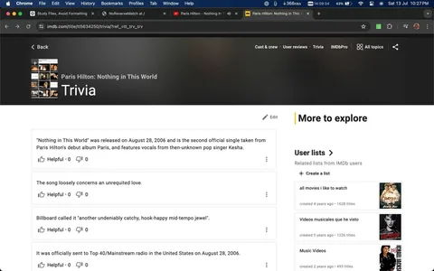 The screenshot displays a page from IMDb dedicated to trivia about the song "Nothing in This World" by Paris Hilton. The header includes the title of the music video and a thumbnail image showing snapshots from the video. Below the header are trivia entries related to the song. These include details about its release date on August 28, 2006, its status as the second official single from Paris Hilton's debut album "Paris," and the involvement of then-unknown pop singer Kesha. The text notes that the song loosely deals with unrequited love and was described by Billboard as a "catchy, hook-happy mid-tempo jewel." The trivia also mentions that it was sent to Top 40/Mainstream radio on the release date. On the right side, there is a section titled "More to explore," featuring user lists related to IMDb users' preferences. The page is part of a web browser interface with standard navigation elements such as back buttons and menu options. The overall design is clean and straightforward, typical of an informational webpage.