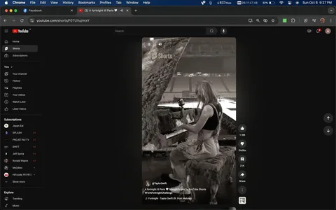 The image is a screenshot from YouTube Shorts, featuring a video from the channel @TaylorSwift. The setting is an indoor stage or rehearsal area, with a woman playing a piano covered in a textured, possibly furry material. The environment suggests a preparation for a large event or concert, with an empty stadium or large venue visible in the background.
The person is seated at the piano, focused on playing, with her back to the camera. She is wearing casual attire, including overalls and a sleeveless top, suggesting a relaxed rehearsal atmosphere. The lighting is natural and bright, highlighting the stage area and creating a professional yet casual ambiance.
Important on-screen text includes "A fortnight til Paris 💕 Brought to you by YouTube Shorts," indicating an upcoming event or theme related to Paris. The hashtag "#ForAFortnightChallenge" suggests a social media challenge or campaign. Additionally, the text mentions "🎵 Fortnight: Taylor Swift (ft. Post Malone)," possibly indicating a musical collaboration or theme associated with the video.
- Site / app: "YouTube"
- Channel / profile: "@TaylorSwift"
- Key OCR lines: "A fortnight til Paris 💕 Brought to you by YouTube Shorts", "#ForAFortnightChallenge", "🎵 Fortnight: Taylor Swift (ft. Post Malone)"