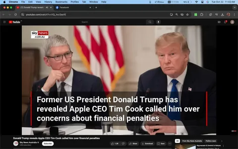 1) Rich description: The image is a screenshot from a YouTube video featuring a discussion between Donald Trump and Tim Cook. Donald Trump, the former US President, is seated on the right. He is dressed in a dark suit jacket, white shirt, and blue tie, looking intently at the camera with a serious expression. To his left is Tim Cook, the CEO of Apple, wearing a dark suit, light shirt, and glasses. He appears thoughtful, with his hand resting on his chin. The setting suggests a formal meeting or discussion, with an American flag visible in the background, indicating a governmental or official context. The image includes text from Sky News Australia, highlighting a revelation that Tim Cook called Donald Trump regarding concerns about financial penalties. The video is from Sky News Australia's YouTube channel. The lighting is bright and evenly distributed, typical of a well-lit meeting room.
2) On-screen text block:
- Title: "Donald Trump reveals Apple CEO Tim Cook called him over financial penalties"
- Channel / profile: "Sky News Australia"
- Site / app: "YouTube"
