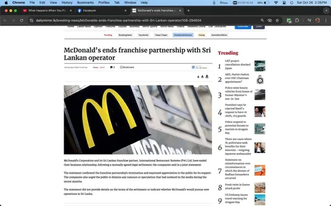1) Rich description: The screenshot is from the website Daily Mirror, showcasing an article about McDonald's ending its franchise partnership with a Sri Lankan operator. The headline is prominently displayed at the top: "McDonald’s ends franchise partnership with Sri Lankan operator." Below the headline, the article is time-stamped at "26 October 2024 11:49 am" and indicates it has been viewed 2952 times. The page features a close-up image of the McDonald's iconic yellow "M" logo against a blurred background of a store facade. The accompanying text states that McDonald's Corporation and International Restaurant Systems (Pvt.) Ltd have ended their business relationship through a mutually agreed legal settlement. The statement appreciates public support and dismisses recent media rumors. Trending topics are listed on the right, including various local and international news stories. The overall layout is clean, with a focus on the article's content and related trending stories.
- Title: "McDonald’s ends franchise partnership with Sri Lankan operator"
- Site / app: "dailymirror.lk"