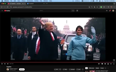 The image is a screenshot from a YouTube video titled "Together." It features Donald Trump and others walking in a parade setting, likely during an inauguration event. In the foreground, Donald Trump is seen waving to the crowd, wearing a dark overcoat with a red tie. Beside him, a woman in a light blue coat and matching gloves also waves, suggesting a formal and celebratory atmosphere. The background features the U.S. Capitol building, indicating a location in Washington, D.C. The scene is set outdoors during the day, with American flags visible along the route, adding to the ceremonial feel. The video is hosted on the YouTube channel "Donald J Trump," which has 3.61 million subscribers. The overall mood is patriotic and formal, with a focus on public engagement and celebration.
- Title: "Together."
- Channel / profile: "Donald J Trump"
- Site / app: "YouTube"