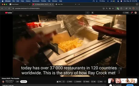 The image appears to be a screenshot from a YouTube video titled "History Buffs: The Founder," which has a view count of 3.6 million and was uploaded two years ago. The video is hosted by a channel named "History Buffs," which has 1.72 million subscribers. 

In the foreground, there is a close-up view of a kitchen setting, specifically a fast-food restaurant kitchen. A person’s hand is visible, holding a utensil that appears to be a frying basket. The hand is wearing a silver bracelet. The frying basket is positioned over a container filled with golden, cooked French fries, which are partially visible. The fries are arranged in a heap, indicating they have just been cooked.

In the background, there are several items visible, including what looks like a stack of red and white boxes, possibly for food packaging, and other kitchen equipment that is not clearly defined due to the focus on the frying basket. The overall lighting in the image suggests an indoor environment, likely a commercial kitchen, with stainless steel surfaces typical of fast-food establishments.

At the bottom of the image, there is a text overlay that reads: "today has over 37 000 restaurants in 120 countries worldwide. This is the story of how Ray Crock met." The text is in white font against a dark background, making it easily readable.

No identifiable individuals are present in the image, and there are no visible logos or trademarks that can be clearly discerned apart from the context of the fast-food setting. The overall atmosphere suggests a focus on food preparation, likely related to the theme of the video discussing the history of a fast-food brand.