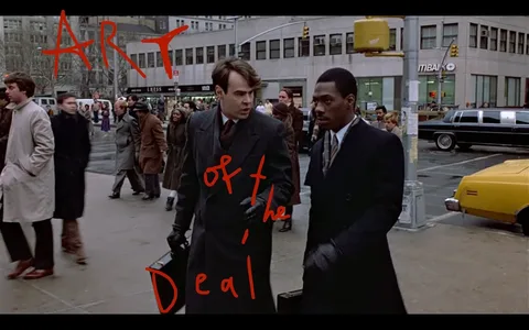 The image depicts a scene from a city street, likely in a bustling urban environment. In the foreground, two men are walking side by side. The man on the left is wearing a dark overcoat, a white dress shirt, and a tie, and he is holding a black briefcase in his right hand. He has light brown hair styled in a side part. The man on the right is dressed in a black overcoat and a white dress shirt with a tie, and he appears to be looking intently at the man on the left. Both men are wearing gloves.

In the background, there is a crowd of people walking in various directions. Most individuals are dressed in winter attire, including overcoats and scarves. Some are carrying bags or briefcases. The scene is busy, with a mix of pedestrians and vehicles. A yellow taxi cab is visible on the right side of the image, and a black limousine is parked nearby. 

The background features a building with large windows and a sign that reads "CITIBANK." Other storefronts are partially visible, but the details are obscured by the crowd. The street appears wet, possibly from recent rain, and the overall atmosphere is one of a typical busy day in a metropolitan area.

In terms of text, there are red handwritten words overlaying the image that read "ART OF the Deal." The text is prominently displayed, but it does not appear to be part of the original scene. 

Overall, the image captures a moment of urban life, with a focus on the two men in conversation amidst a lively street setting.