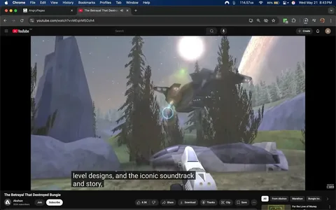 The image depicts a scene from a video game, likely related to the "Halo" franchise, given the visual elements present. 

In the foreground, there is a white futuristic weapon, resembling a pistol, positioned on a rocky surface. The weapon has a sleek design with a prominent barrel and a grip that suggests advanced technology. 

To the right of the weapon, there are large, gray rocks and a few green trees, indicating a natural environment. The trees are tall and slender, with a dark green color, suggesting a forested area. 

In the background, a large, dark spacecraft is visible, hovering above the landscape. The ship has a somewhat angular design with visible lights and details that suggest it is a military or sci-fi vehicle. The ship appears to be emitting a blue light, possibly indicating some form of technology or energy. 

The sky is a gradient of colors, transitioning from light to dark, with a large celestial body, possibly a planet, visible in the background. The presence of stars and a bright light source, likely a sun, adds to the otherworldly atmosphere of the scene.

At the bottom of the image, there are subtitles that read: "level designs, and the iconic soundtrack and story," indicating that this is likely a video discussing aspects of the game. 

The video player interface is visible at the bottom, showing options to share, download, and subscribe, along with the channel name "Akshon" and the subscriber count of 352K. The title of the video is "The Betrayal That Destroyed Bungie," suggesting a focus on the history or impact of the game developer Bungie.

Overall, the image captures a moment from a video game with a focus on sci-fi elements, technology, and a natural landscape, accompanied by textual information related to the video content.