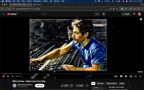 The image shows a scene from a video on YouTube titled "Will to Power - Baby I Love Your Way." The video is currently playing, and the time indicator shows it is at 0:06 of a total duration of 4:11. The video is displayed in a darkened setting, likely a recording studio, with a focus on a man operating a sound mixing console.

The man is positioned to the right of the frame, with his face partially obscured. He has long, dark hair and a beard. He is wearing a blue shirt, which contrasts with the darker background. His right arm is extended towards the mixing console, where he appears to be adjusting controls. The console itself is visible, featuring various knobs and sliders, some of which are illuminated.

In the background, there are blurred outlines of equipment and possibly other studio elements, but specific details are not discernible due to the low lighting. The overall atmosphere is intimate and focused on the music production process.

The YouTube interface is visible at the bottom of the image, displaying the channel name "WillToPowerVEVO" along with a subscriber count of 65.3K. There are also playback controls, including a play/pause button, volume control, and options for sharing the video. The video is categorized under "Soft Rock" and "Rhythm & Blues," as indicated by the labels on the interface.

No other text or logos are prominently visible in the image aside from the YouTube branding. The setting does not provide any additional context about the location or event beyond the implication of a music recording session.