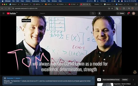 The image features two men smiling in front of a whiteboard filled with mathematical equations and diagrams. The man on the left has light brown hair and is wearing a black suit over a white shirt. The man on the right has darker hair and is dressed in a dark button-up shirt. A pink handwritten note identifies one of the men as "TOM." 

Text on the image states, "I will always mention Daniel Lewin as a model for excellence, determination, strength," suggesting a tribute to Daniel Lewin, who is known for his role in the tech industry and his tragic death during the September 11 attacks. 

The background equations and diagrams imply a context of academic or professional discussion, possibly related to technology or mathematics. The overall tone is positive and respectful, reflecting admiration for Lewin. The mention of September 11 introduces a sensitive historical context, potentially evoking strong emotions related to loss and remembrance.