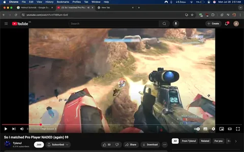 The image captures a moment from a gaming video on YouTube, specifically from a channel called "Tylenul," which has over 631,000 subscribers. The video is titled "So I matched Pro Player NADED (again) 👀" and is currently playing at the 2:29 mark of a 15:25 long video. The gameplay appears to be from a first-person shooter, likely from the "Halo" series, given the visual style and the elements present.

In the foreground, we see a character holding a futuristic weapon, which resembles a sniper rifle. The weapon features a prominent scope with a blue lens, suggesting it’s designed for long-range targeting. The character is positioned on a rocky ledge, aiming down at an enemy below. The HUD (heads-up display) shows a score of 22, indicating the player's current kill count or points, and a "TEAM SLAYER" label, which is a common game mode in Halo.

The environment is a sandy, outdoor landscape with rocky formations and patches of green vegetation, typical of a sci-fi setting. To the left, a red vehicle is partially visible, suggesting that players may have access to vehicles in this game mode. Below the ledge, an enemy character, identifiable by their armor, is in the midst of movement, possibly trying to evade fire. The action appears intense, with the player actively engaging in combat.

The overall tone of the image conveys excitement and competitiveness, characteristic of multiplayer gaming. The player's focus on the enemy, combined with the vibrant colors of the environment, enhances the sense of urgency and action. The branding of the YouTube interface is present, with the recognizable red and white logo, along with options to like, share, and subscribe, indicating viewer engagement.

This snapshot encapsulates the thrill of gaming, showcasing not just the action but also the community aspect of sharing gameplay experiences online. The use of emojis in the title adds a playful touch, hinting at a lighthearted approach despite the competitive nature of the content.