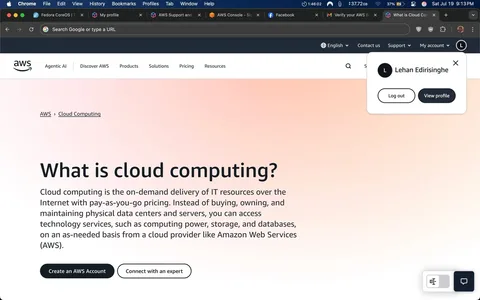 The image displays a webpage from Amazon Web Services (AWS) focused on cloud computing. The background features a gradient transitioning from white to a soft peach color. Prominently, the text "What is cloud computing?" is displayed in large, bold font, followed by a brief explanation of cloud computing, emphasizing its on-demand delivery and pay-as-you-go pricing model.

At the bottom of the page, there are two buttons: "Create an AWS Account" and "Connect with an expert." In the top right corner, a user profile icon is visible, showing the name "Lehan Edirisinghe" with options to log out or view the profile. The AWS logo is present in the upper left corner, reinforcing the brand identity.

No people, gestures, or emotions are depicted in the image, as it is a digital interface. There are no explicit, controversial, or sensitive content elements present. The tone is informative and professional, aimed at educating users about cloud computing services.